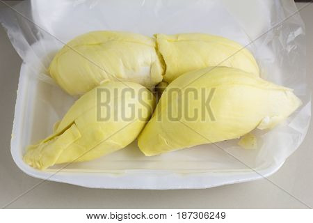 Durian King of Fruits isolated on white background. Close up of peeled durian flesh isolated on white background.