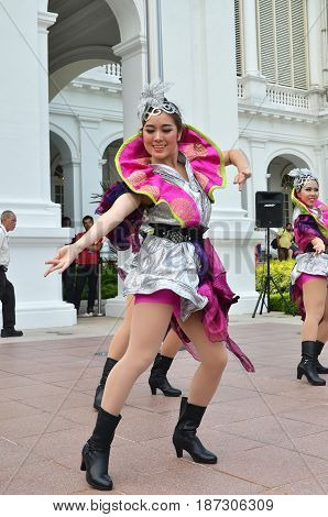 SINGAPORE- MAY 01 2017: Chinese dancer performs at the Istana Open House in Singapore on Labour Day.