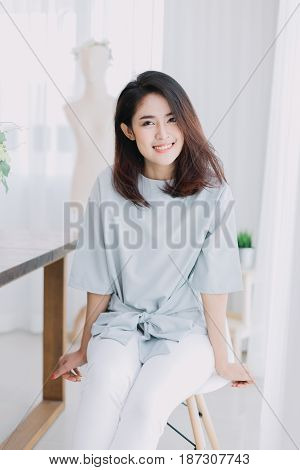 Portrait Of Beautiful Asian Girl With Beautiful Clothing And Relex Posting.