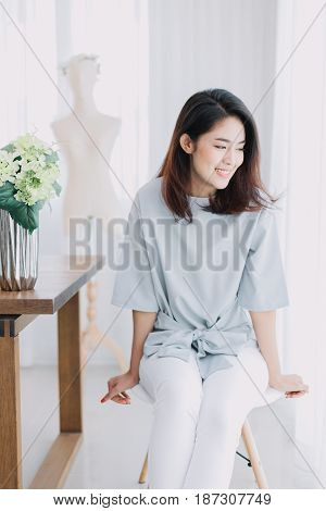 Portrait Of Beautiful Asian Girl With Beautiful Clothing And Relex Posting.
