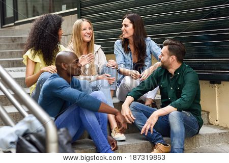 Group Of Friends Having Fun Together Outdoors