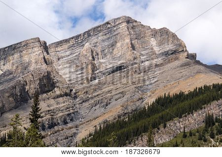 A chiseled and primordial mountain in Kananaskis country.