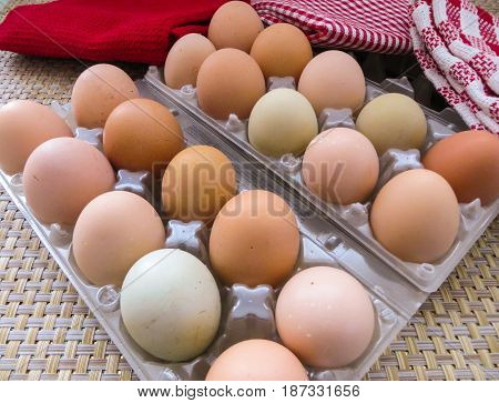 Chicken eggs on a table in plastic packing.
