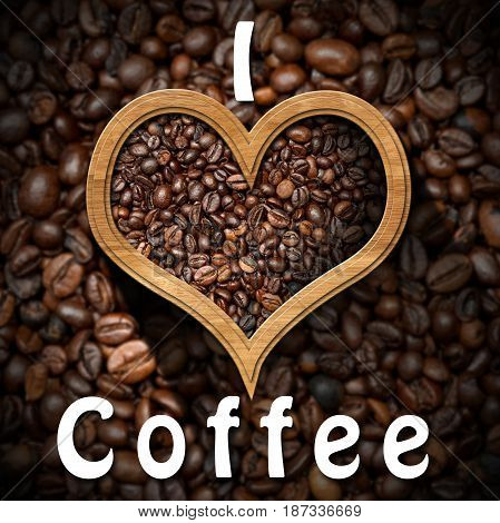 I Love Coffee - Roasted coffee beans in a heart shaped wooden frame with many coffee beans on background
