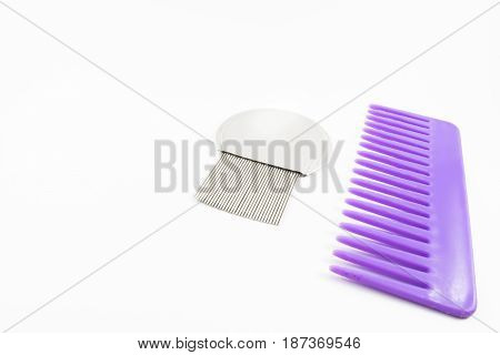 A violet comb and a fine comb.