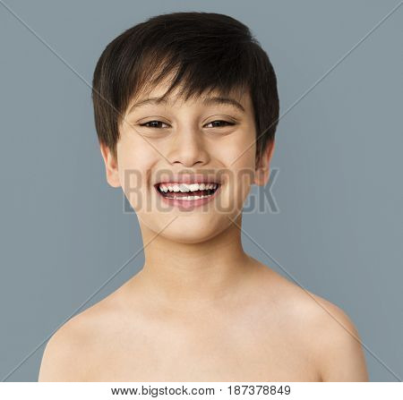Little Boy Smiling Face Expression Topless Studio Portrait