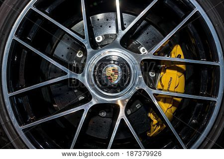 STUTTGART GERMANY - MARCH 03 2017: The braking system of the sports car Porsche 911 Turbo S 2016. Black and white. Europe's greatest classic car exhibition "RETRO CLASSICS"