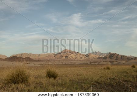 panoramic view death valley with some mountains on the back