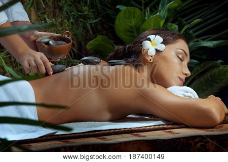 portrait of young beautiful woman in spa environment