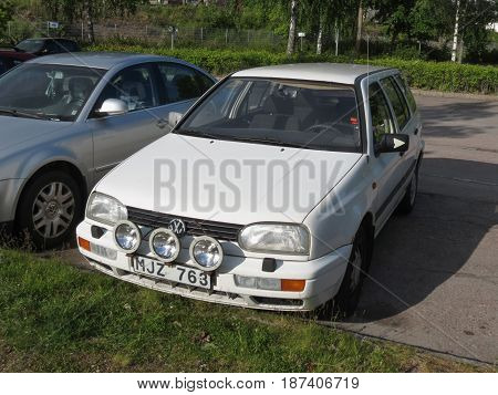 White Volkswagen Passat Car In Stockholm