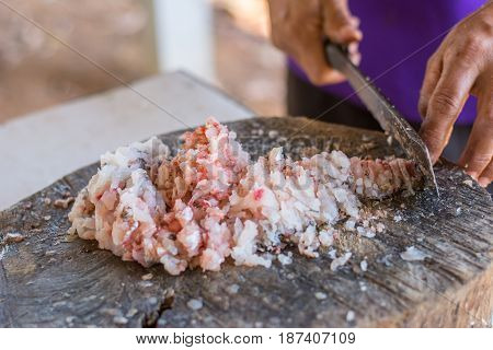 Chef cutting fish before cooking. Chef cutting fish before cooking