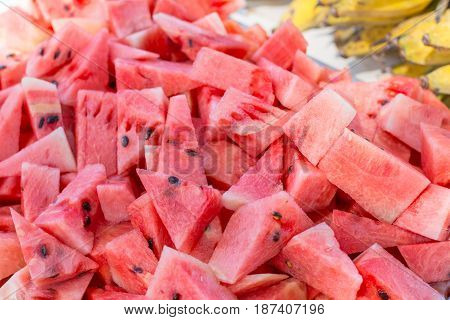 Watermelon sliced on a tray. Watermelon sliced on a tray.