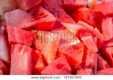 Watermelon sliced on a tray.  Watermelon sliced on a tray.