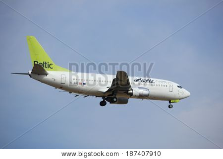 Amsterdam the Netherlands - July 21st 2016: PH-BGO KLM Royal Dutch AirliYL-BBS Air Baltic Boeing 737 approaching Polderbaan runway at Schiphol Amsterdam Airport arriving from Riga Latvia