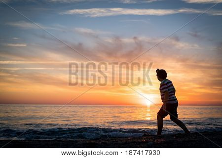 Happy boy enjoying the beach