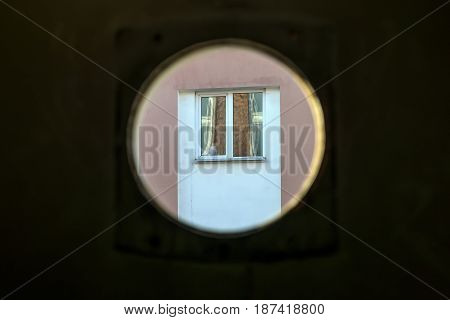 old brick window in a ruined building