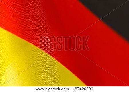Germany flag background close-up. Star-striated american banner