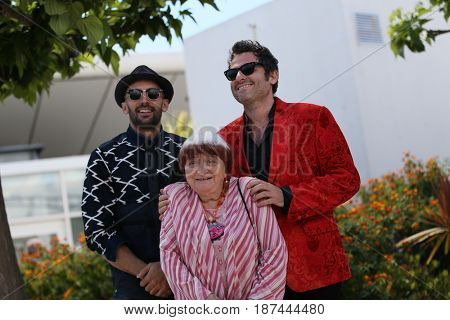 Matthieu Chedid (R), Agnes Varda and JR (L) attend the 'Faces, Places (Visages, Villages)' photocall during the 70th annual Cannes Festival at Palais des Festivals on May 19, 2017 in Cannes, France. 