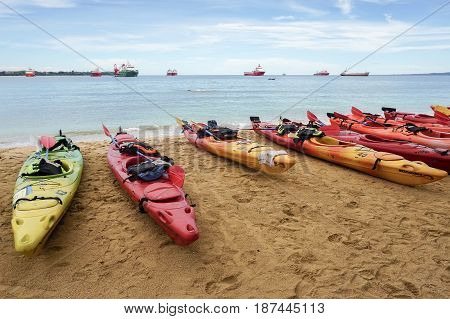 Labuan,Malaysia-Feb 19,2017:Kayaks in various colors in Labuan island,Malaysia.Malaysia is the ideal place for water sports,like white water rafting,kayaking,scuba diving & sailing.