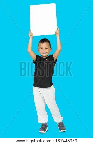Little Boy Holding Blank Empty Paper Board Studio Portrait