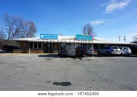 BAY VIEW, MICHIGAN / UNITED STATES - NOVEMBER 26, 2016: One may apply for a driver's license at the office of the Michigan Secretary of State, and buy yarn and quilting supplies at Cindy's Northern Crafts, in a Bay View strip mall.