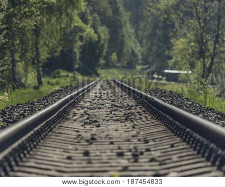 Railway track in spring fog sunny nice day