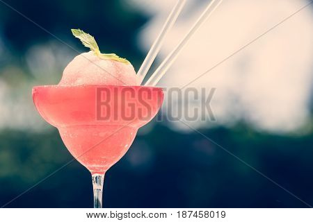 Frozen Strawberry Margarita Cocktail At The Edge Of A Resort Pool.  Concept Of Luxury Vacation