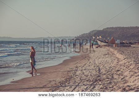 GOA INDIA - MARCH 6: Beautiful blonde woman at Arambol beach on March 6 2017 Goa India.