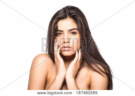 Beautiful Young Woman With Clean Fresh Skin Touch Own Face . Facial Treatment . Cosmetology , Beauty