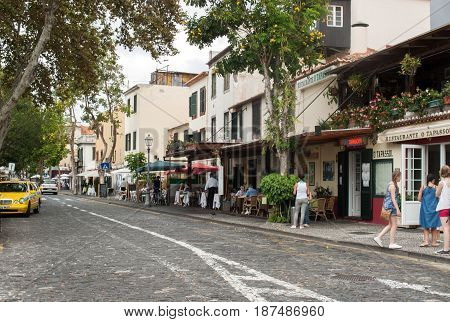 FUNCHALMADEIRA PORTUGAL SEPTEMBER 4 2016: Zone Velha - the oldest district famous for its best restaurants and cafes in Funchal. Madeira Portugal