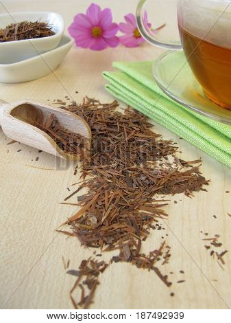Glass cup of Lapacho tea and tea bark