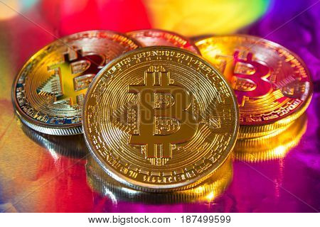 Cryptocurrency Physical Golden Bitcoin Coin On Colorful Background
