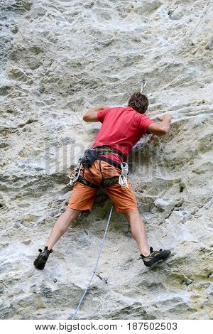 Person Climbing On The Rock At Engelberg
