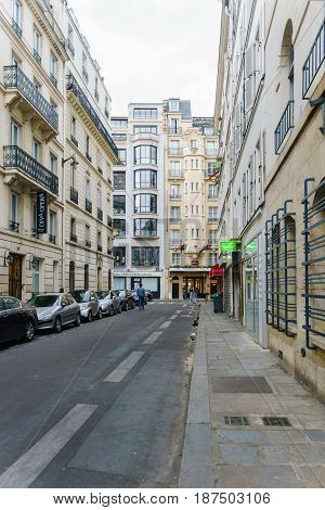 Paris France - May 1 2017: Rue Geoffroy - Marie road in evening the small alley in central Paris on May 1 2017 in Paris France.