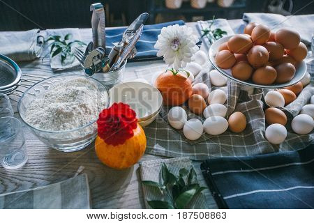 Baking Cake Ingredients - Bowl, Flour, Eggs, Egg Whites Foam, Eggbeate On Wood Chalkboard From Above