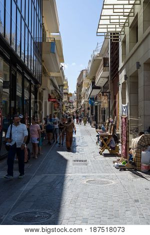 HERAKLION GREECE - JULY 09 2016: Crete. The popular shopping street - Daidalou Street in the historic center of the city. Heraklion - the largest city on the island.