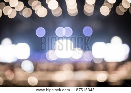 Blurred Background : Bokeh Lighting In Concert With Audience ,music Showbiz Concept