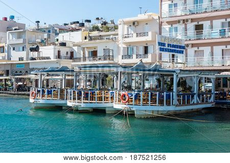 CRETE GREECE - JULY 11 2016: The embankment of a small elite tourist town - Elounda municipality of Agios Nikolaos.