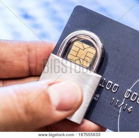 Credit cards and simle mechanical lock. Security concept.