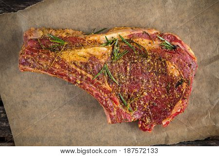 Fresh Raw Beef bone rib marinade with herbs.