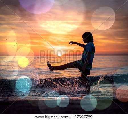 Happy boy enjoying the beach
