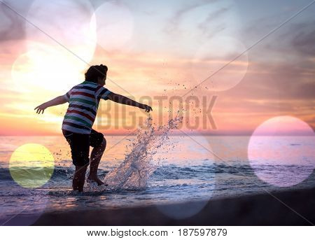 Happy boy enjoying the beach