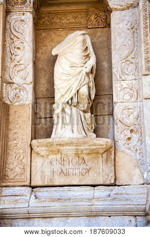 Statue in front of the Celsus Library, Ephesus, Selcuk, Lycia, Turkey,