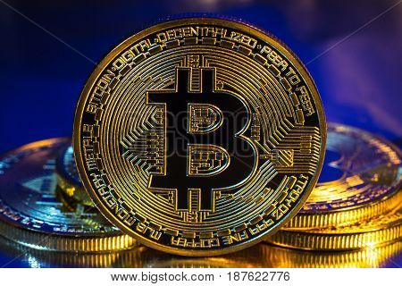 Cryptocurrency Physical Golden Bitcoin Coin On Colorful Background