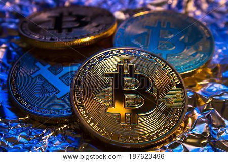 Cryptocurrency Physical Golden Bitcoin Coin On Colorful Background