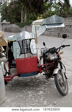 In Asia Philipphines The Typical  Motorbike