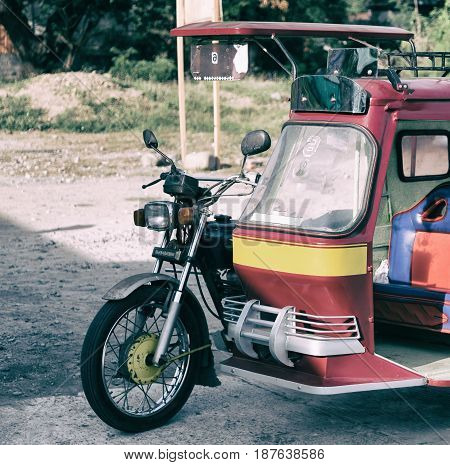 In Asia Philipphines The Typical  Motorbike