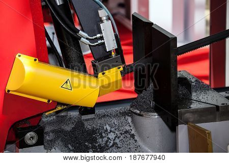 Metalworking equipment, bandsaw machine, closeup metal processing