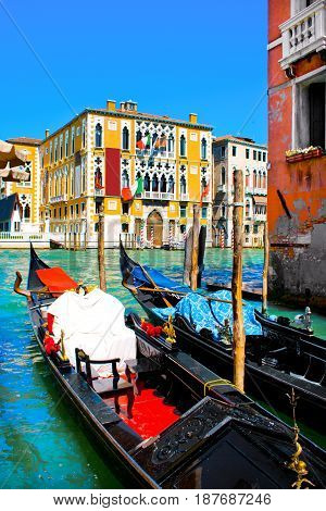 Traditional Gondolas At Canal Grande With Palazzo Cavalli-franchetti In Venice, Italy