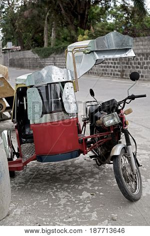 In Asia Philipphines The Typical  Motorbike